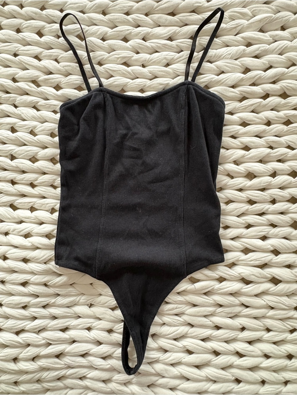 Sleek Black Spaghetti-Strap Bodysuit